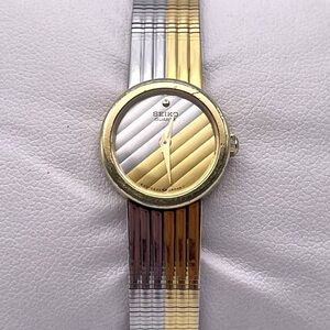 Seiko Women's Gold and Silver Striped Watch